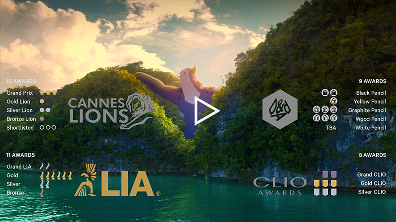 Palau Pledge artwork showing a lagoon, a giant creature and international advertising awards.