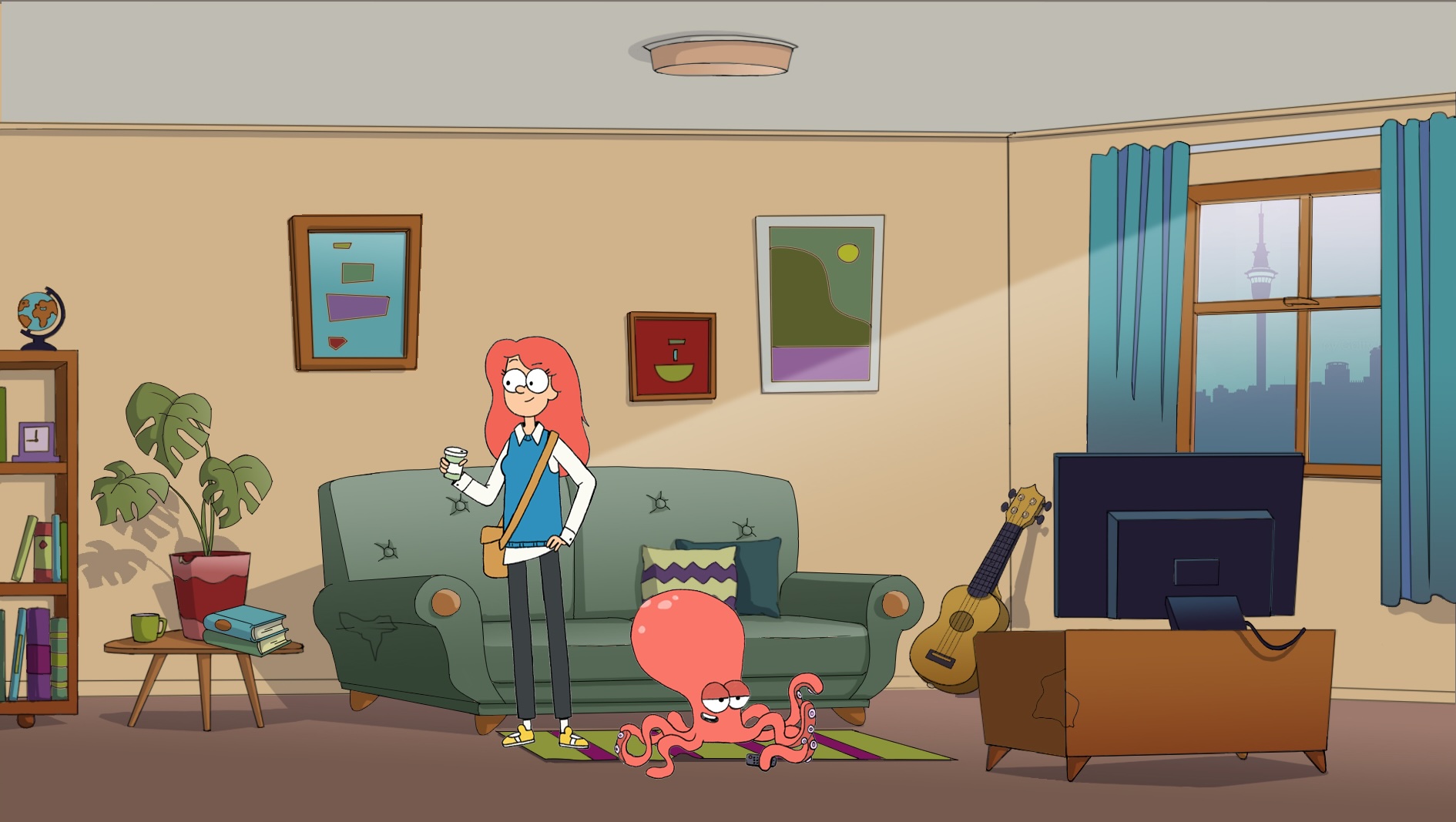 Cassandra stands behind Solomon, her octopus flatmate, in their living room.