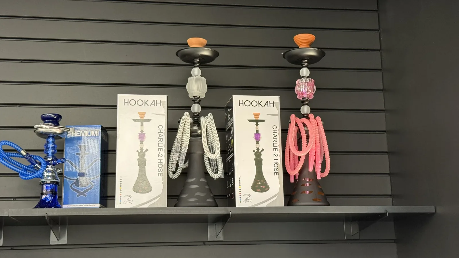 Hookahs, bowls, and shisha on display at Ember Smoke & Vape in Mesa, Arizona