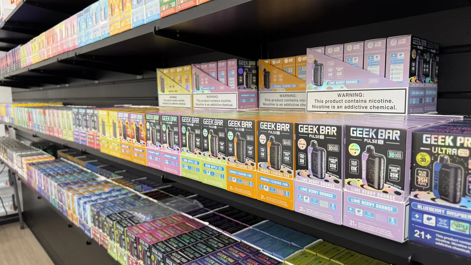 Assorted disposable vapes displayed at Ember Smoke & Vape in Mesa, Arizona