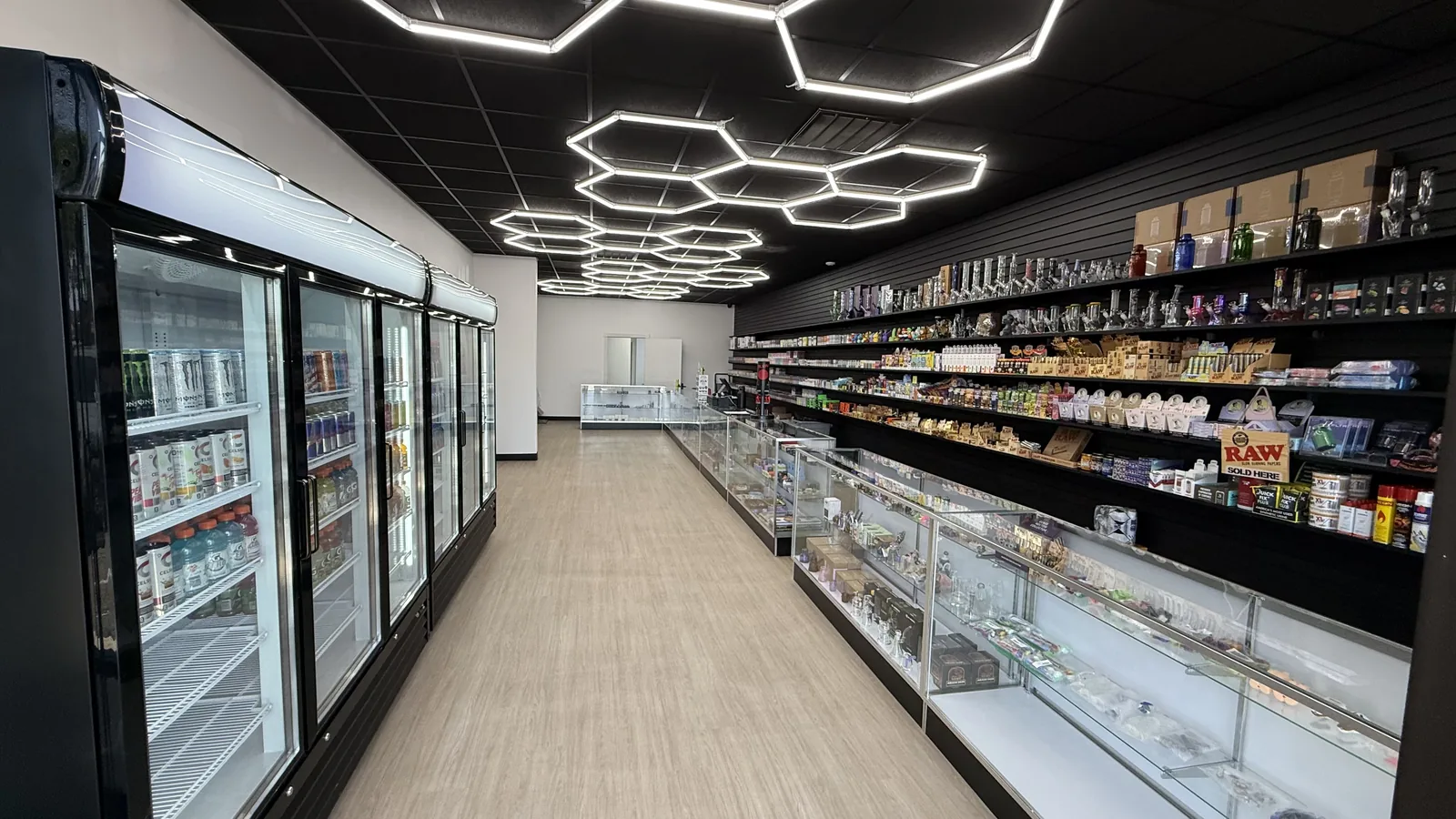 Interior aisle of Ember Smoke & Vape, the Mesa, Arizona smoke and vape store featured in The Mesa Tribune