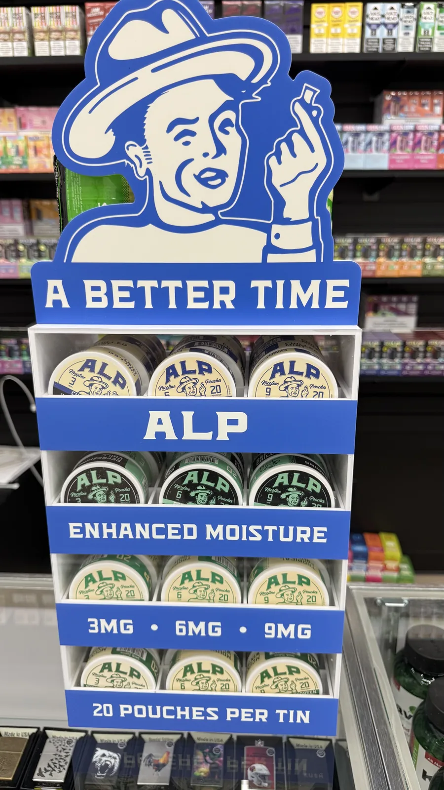 Nicotine pouch cans and tobacco alternatives on display at Ember Smoke & Vape in Mesa, Arizona