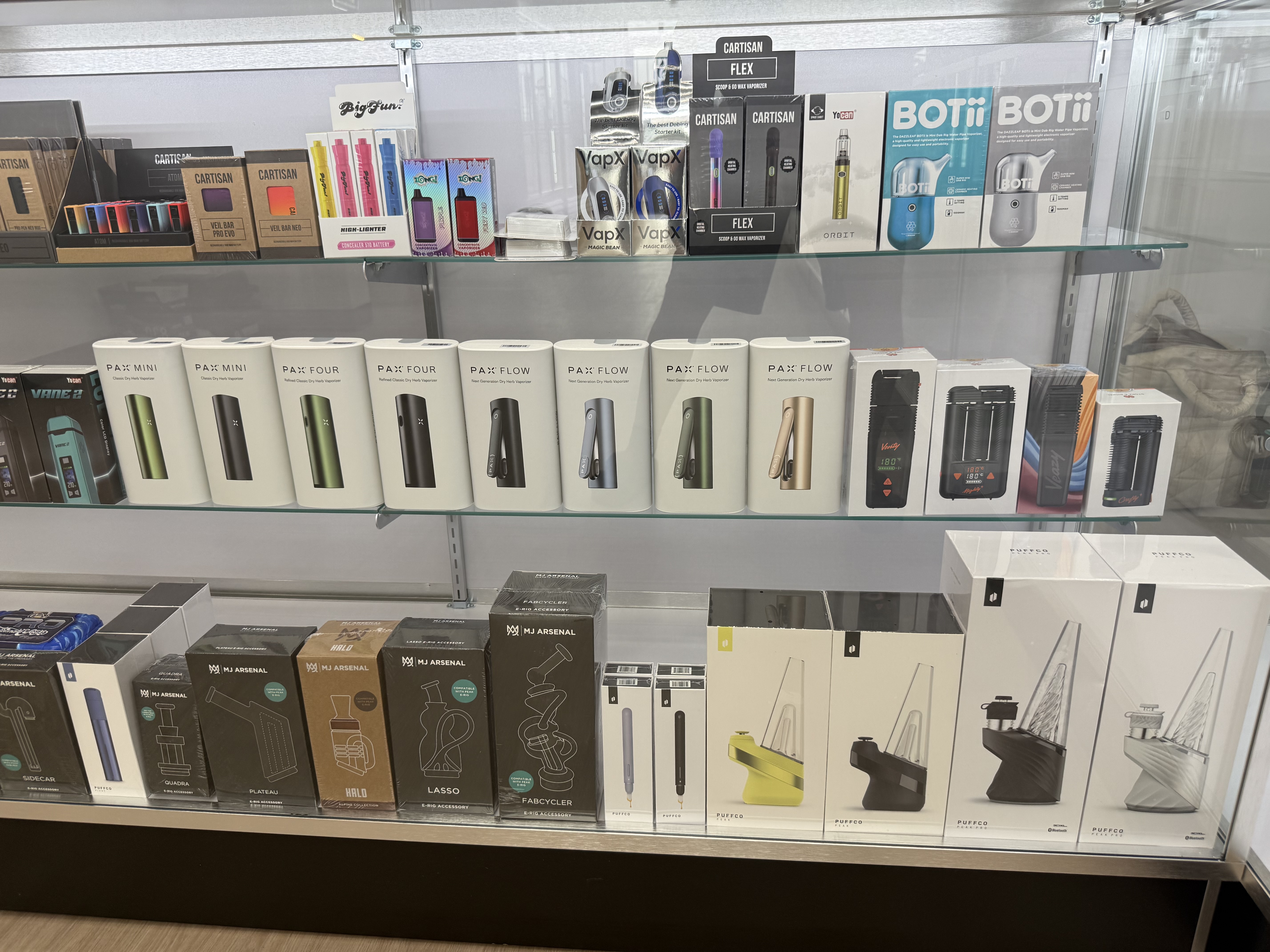 Dry-herb vaporizers, concentrate e-rigs and vape devices on display at Ember Smoke & Vape in Mesa