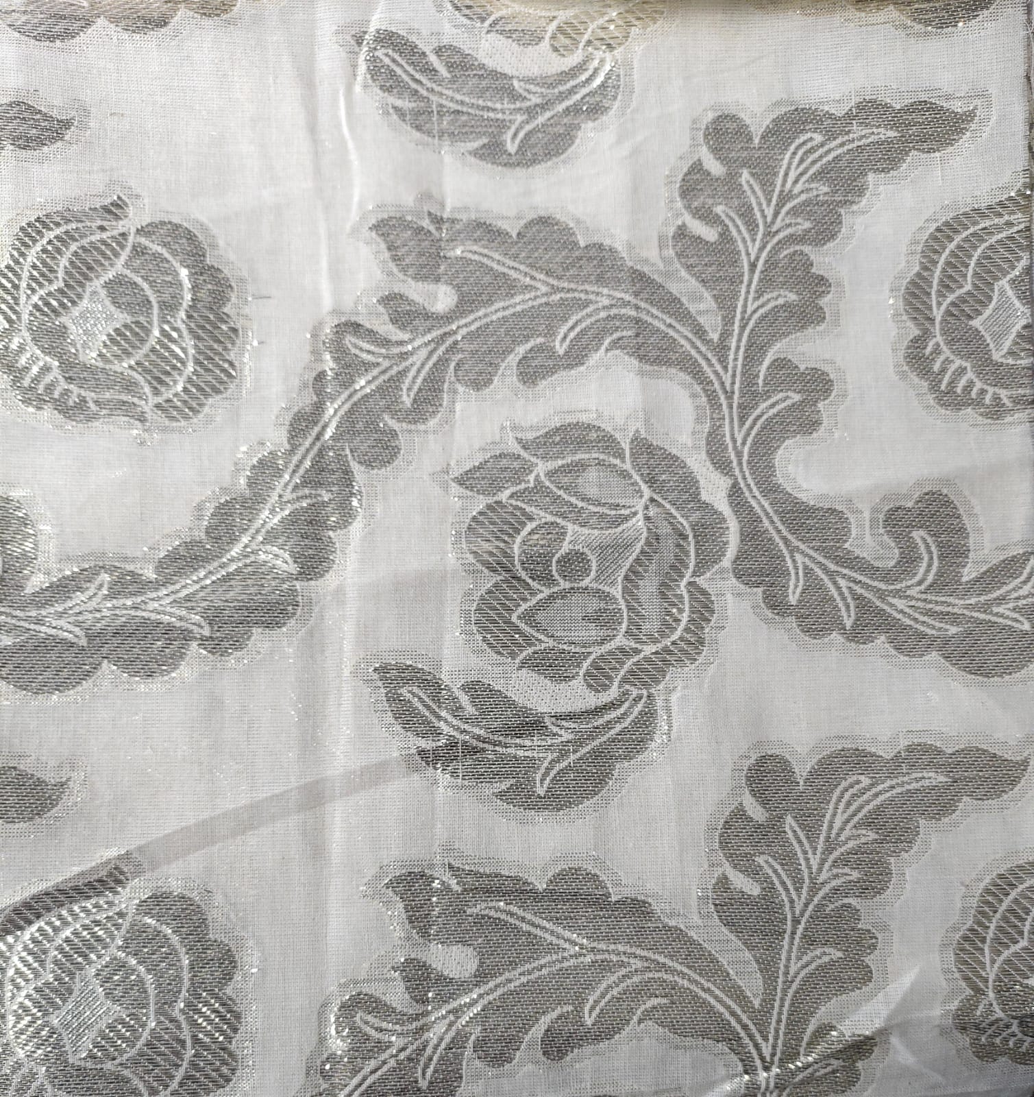 Close-up of soft, wrinkled pink cotton fabric displaying fine weave texture.