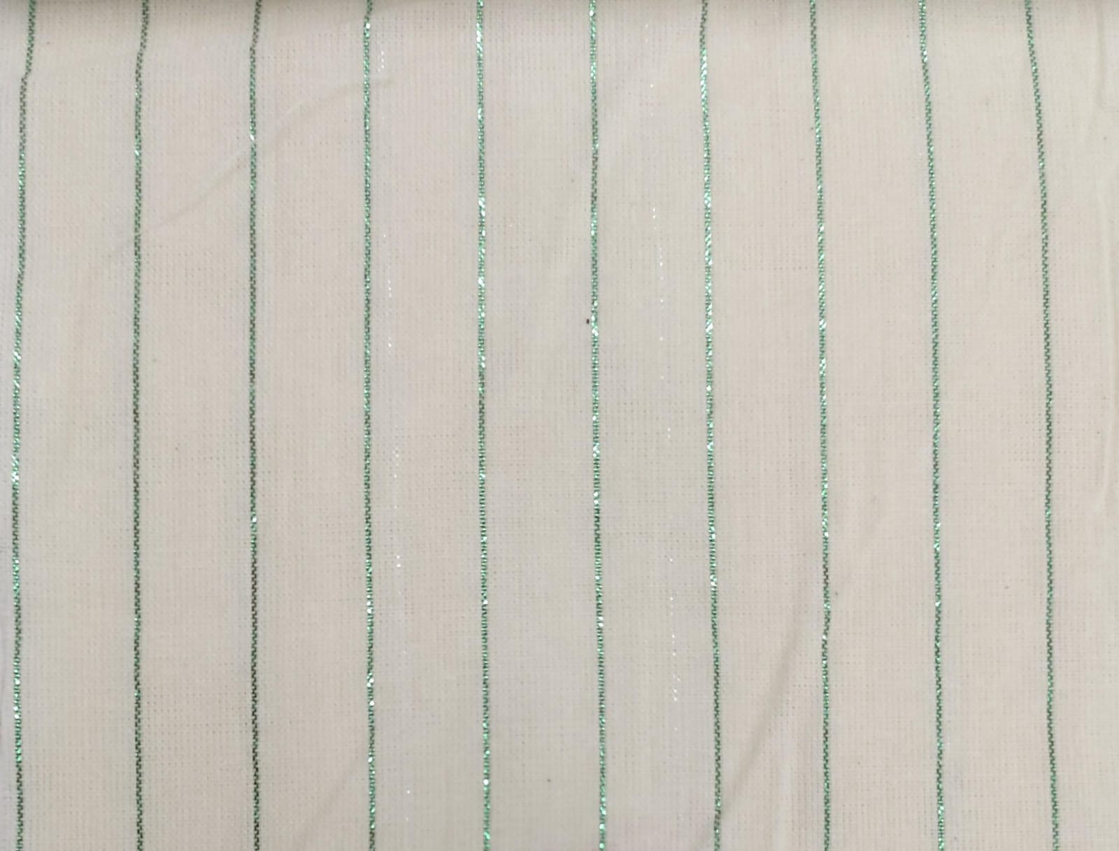 Close-up of soft, wrinkled pink cotton fabric displaying fine weave texture.