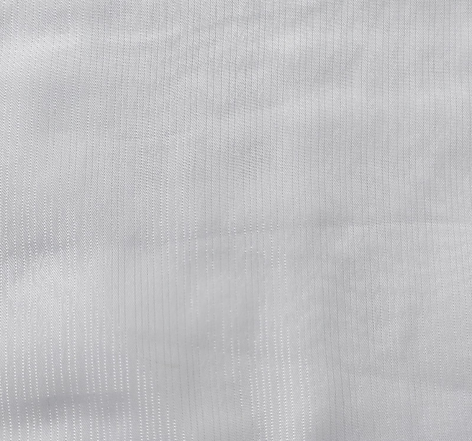 Close-up of soft, wrinkled pink cotton fabric displaying fine weave texture.