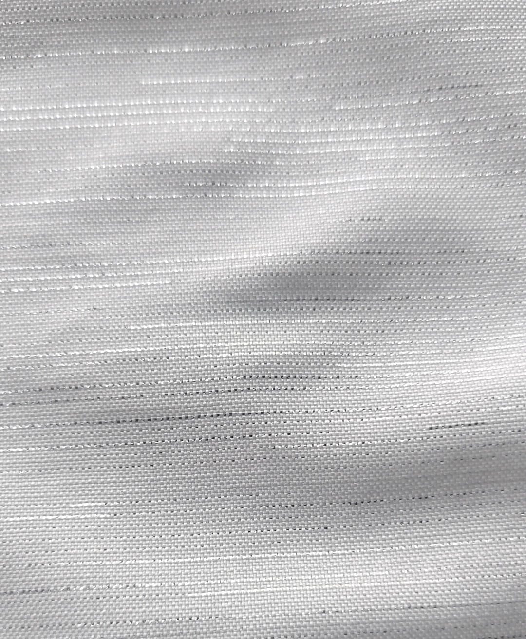 Close-up of soft, wrinkled pink cotton fabric displaying fine weave texture.