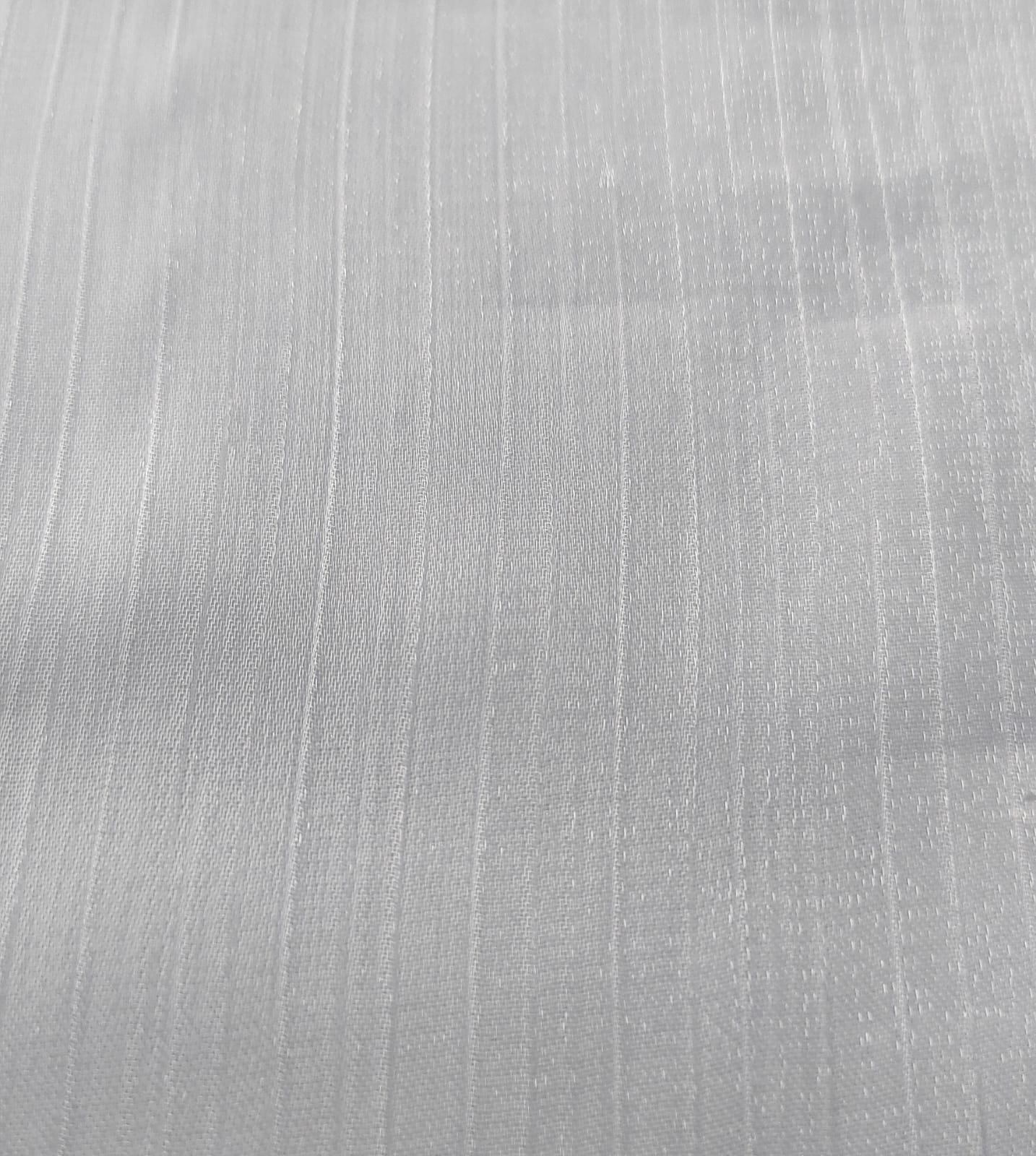 Close-up of soft, wrinkled pink cotton fabric displaying fine weave texture.