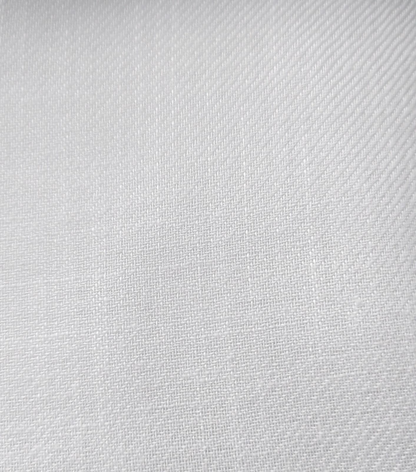 Close-up of soft, wrinkled pink cotton fabric displaying fine weave texture.