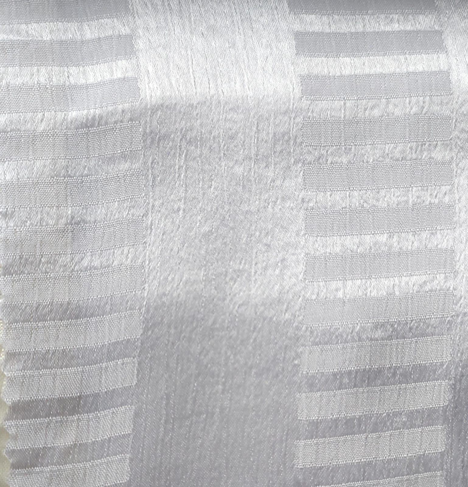 Close-up of soft, wrinkled pink cotton fabric displaying fine weave texture.