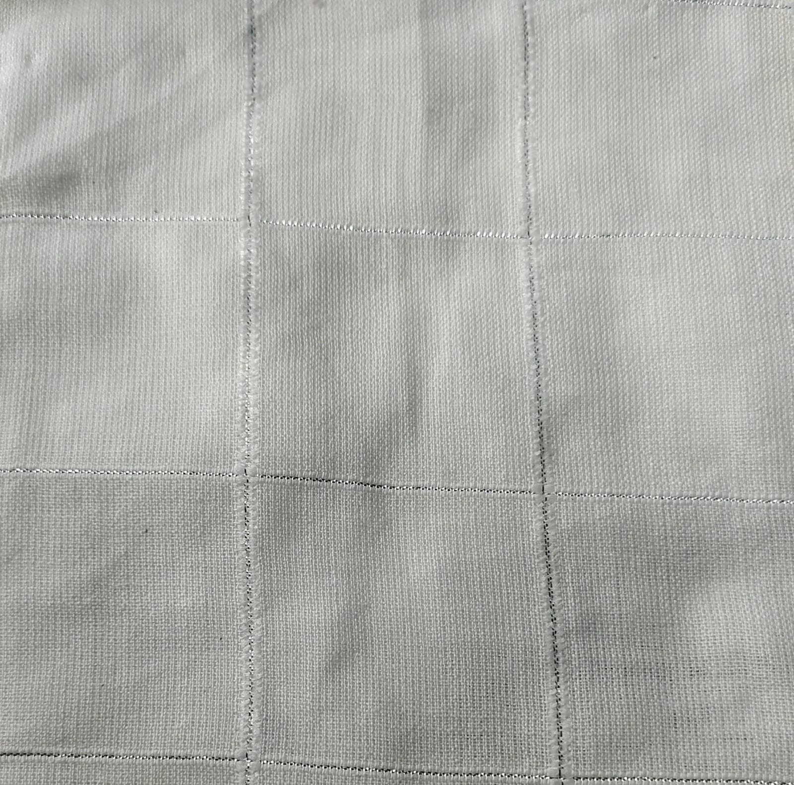 Close-up of soft, wrinkled pink cotton fabric displaying fine weave texture.