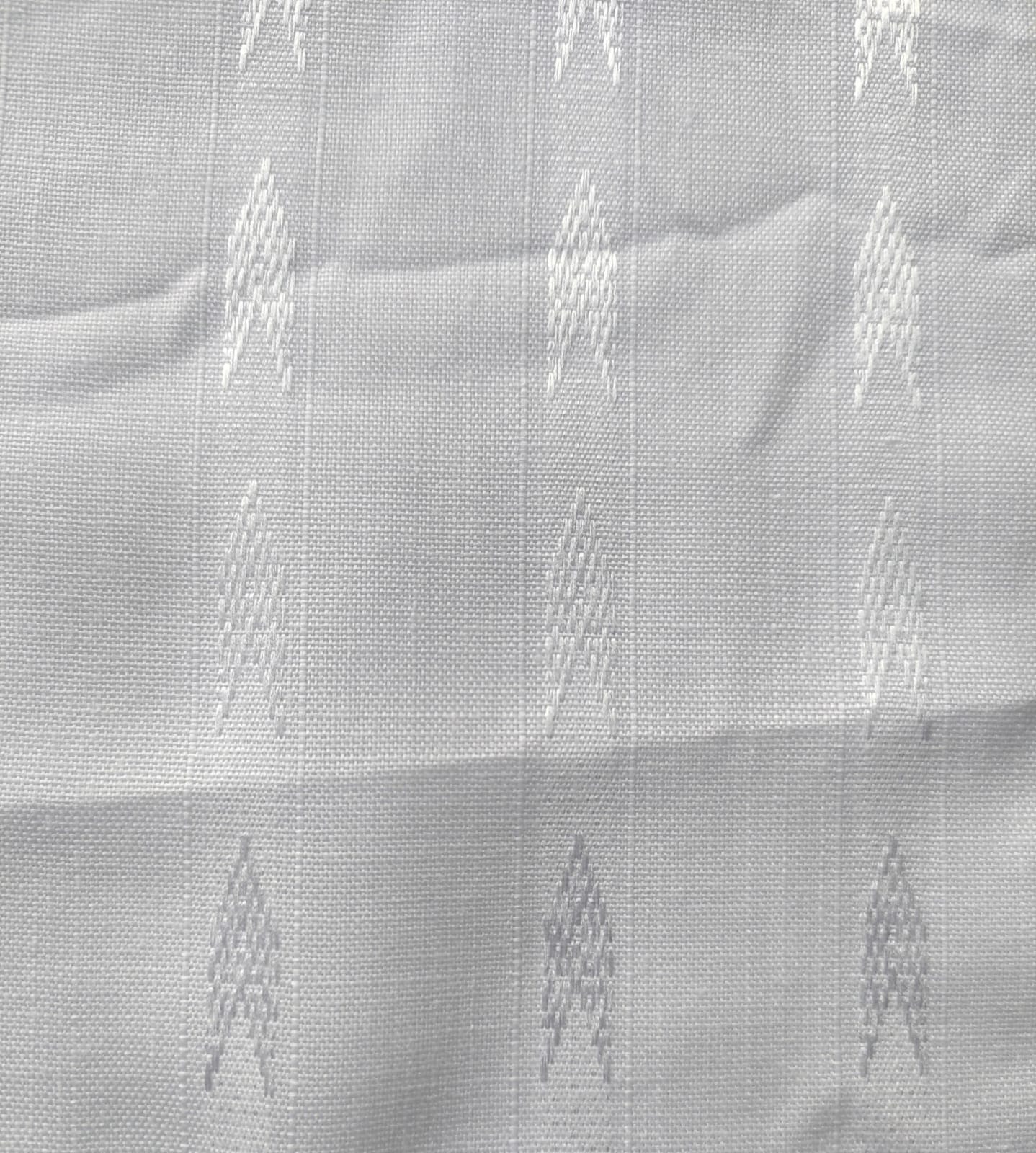 Close-up of soft, wrinkled pink cotton fabric displaying fine weave texture.
