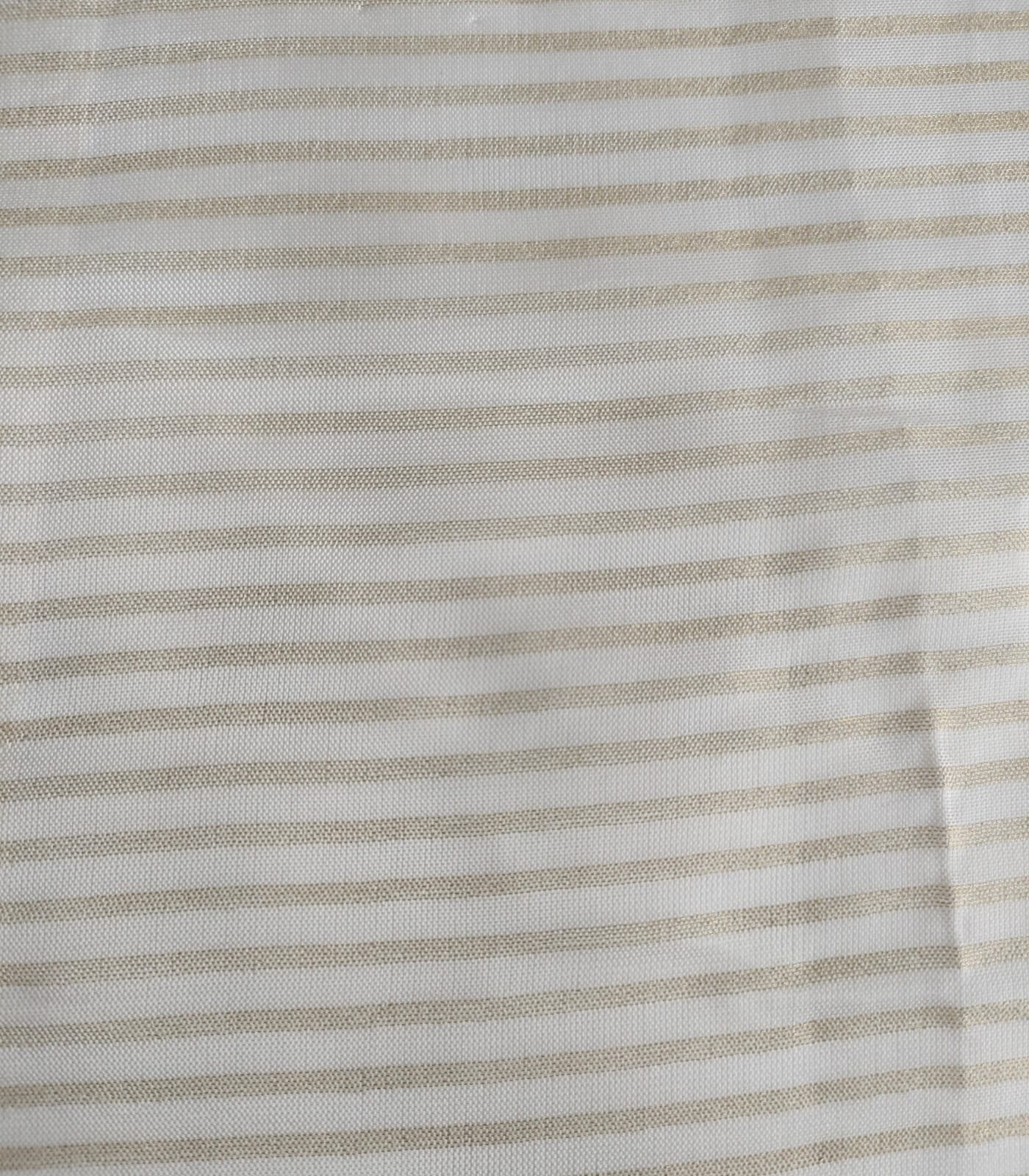 Close-up of soft, wrinkled pink cotton fabric displaying fine weave texture.