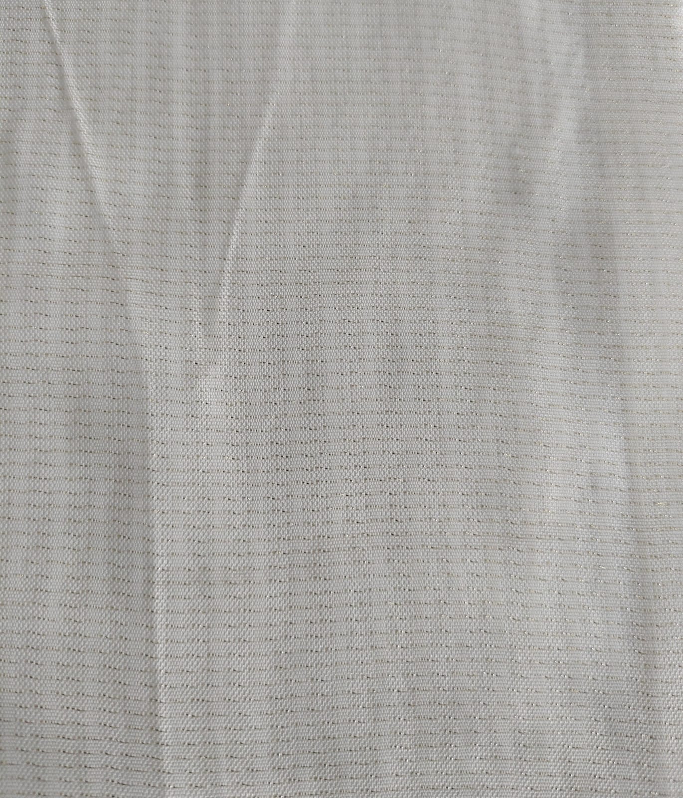 Close-up of soft, wrinkled pink cotton fabric displaying fine weave texture.