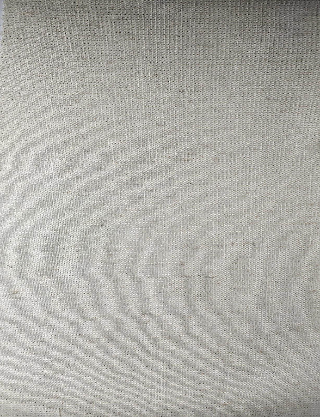 Close-up of soft, wrinkled pink cotton fabric displaying fine weave texture.