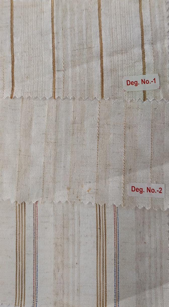 Close-up of soft, wrinkled pink cotton fabric displaying fine weave texture.
