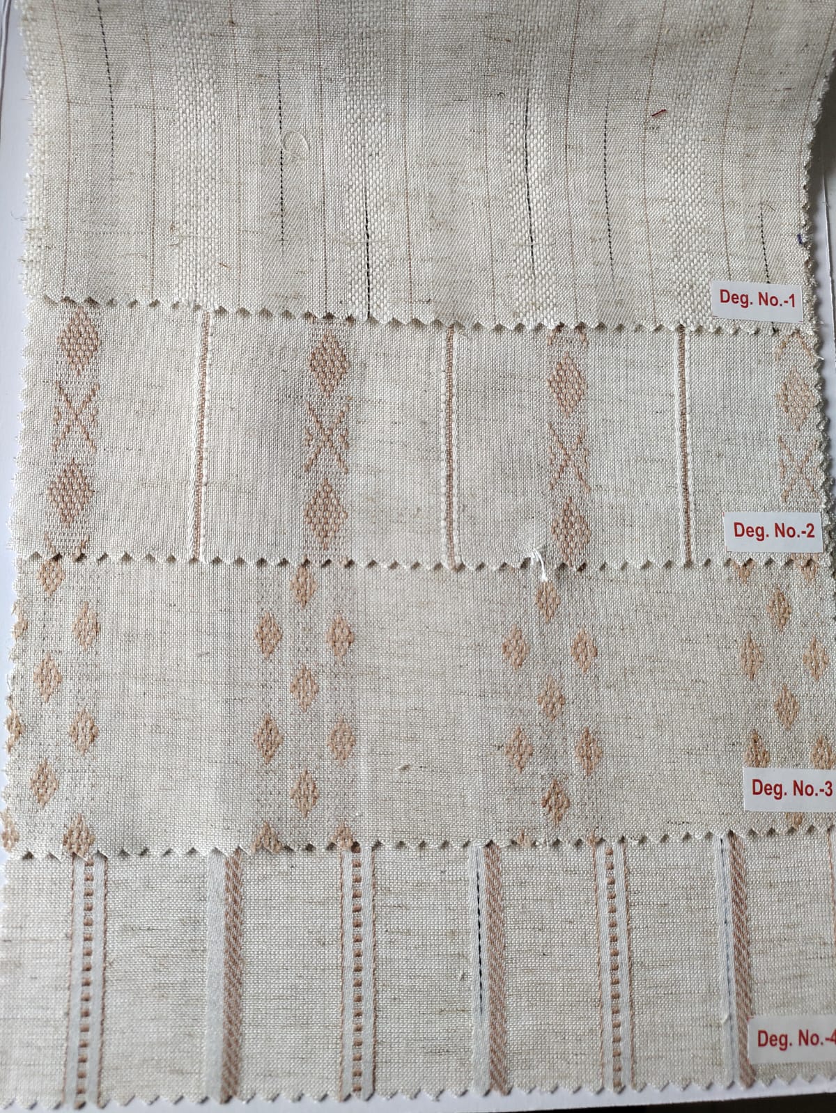 Close-up of soft, wrinkled pink cotton fabric displaying fine weave texture.