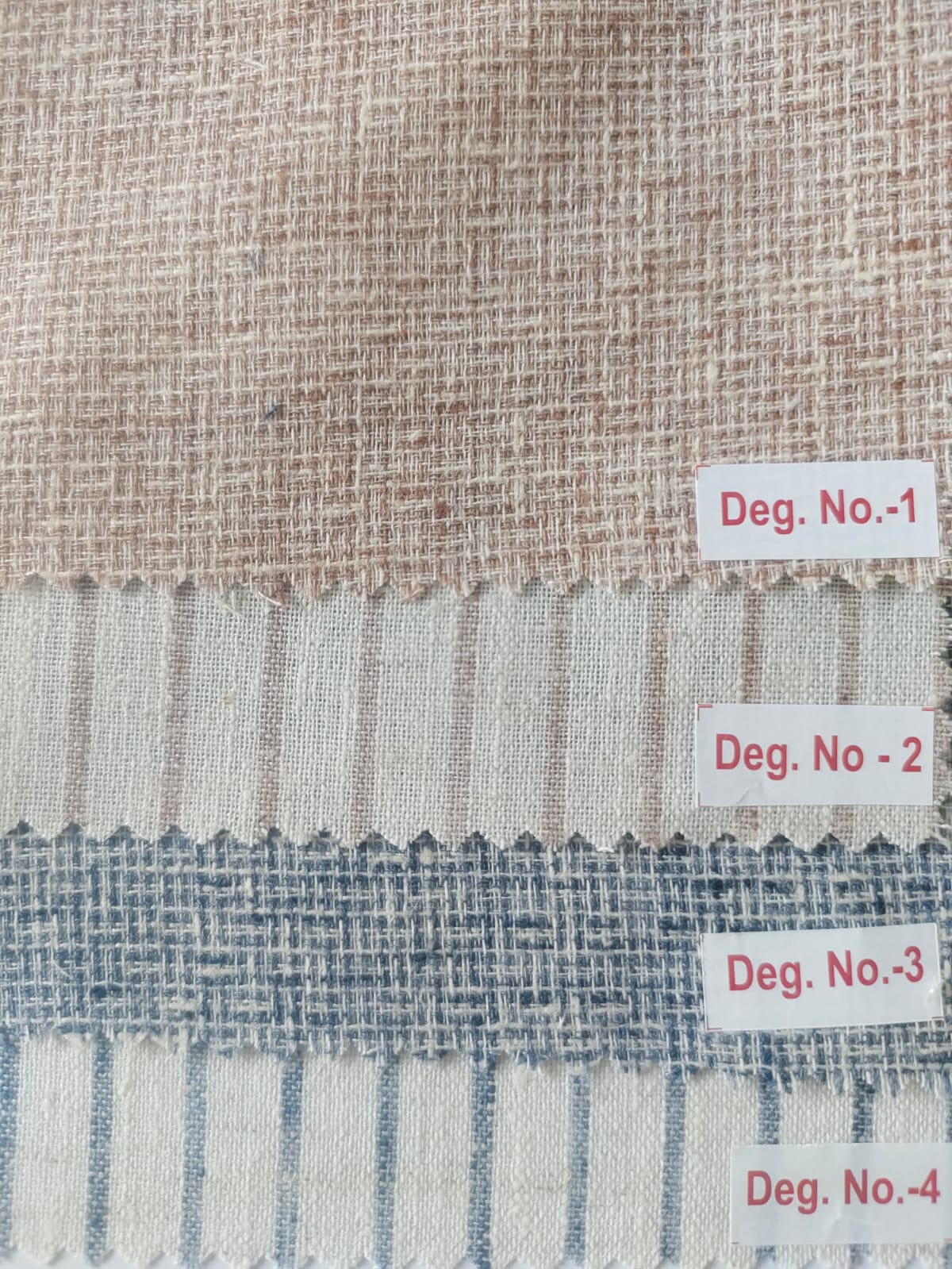 Close-up of soft, wrinkled pink cotton fabric displaying fine weave texture.