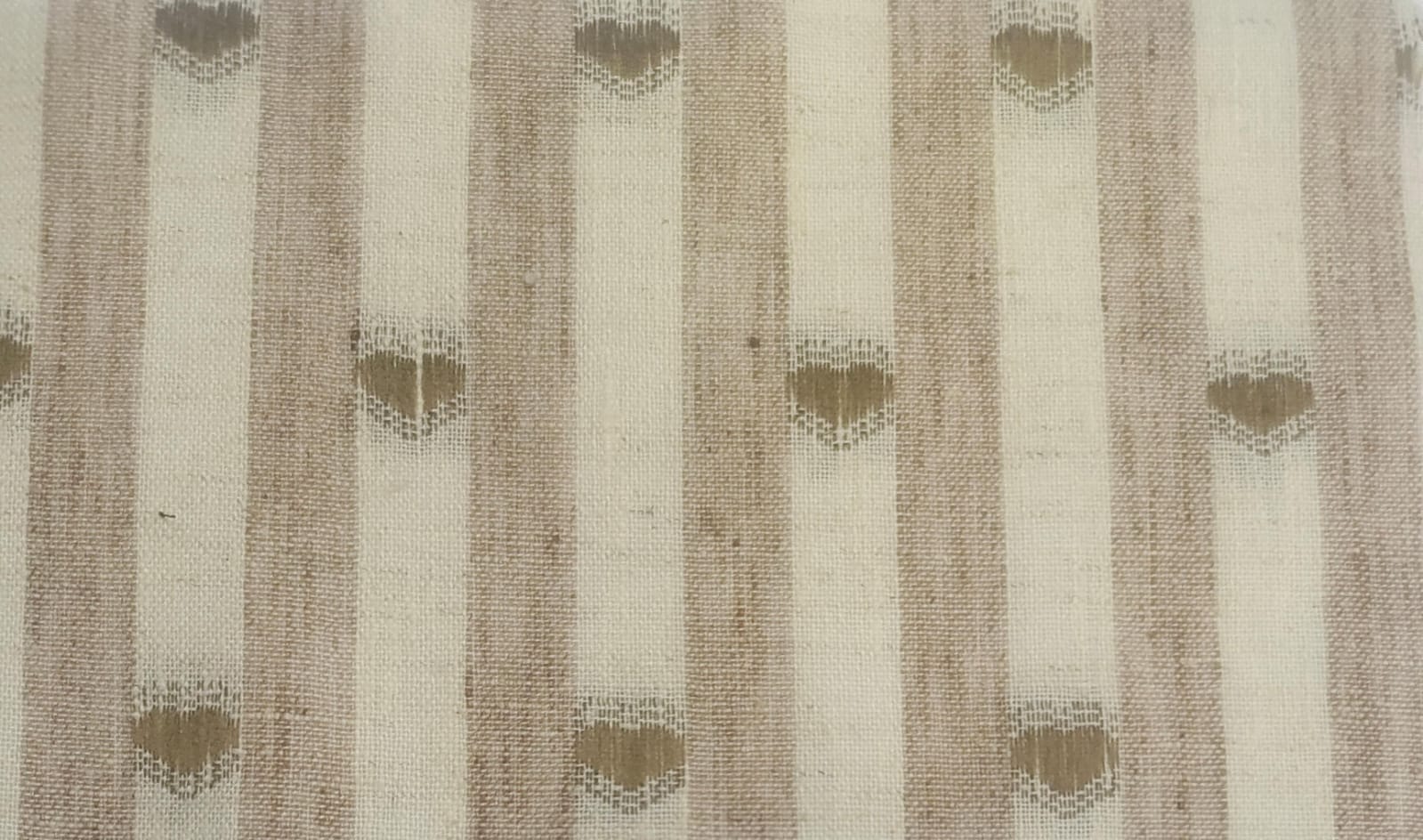 Close-up of soft, wrinkled pink cotton fabric displaying fine weave texture.