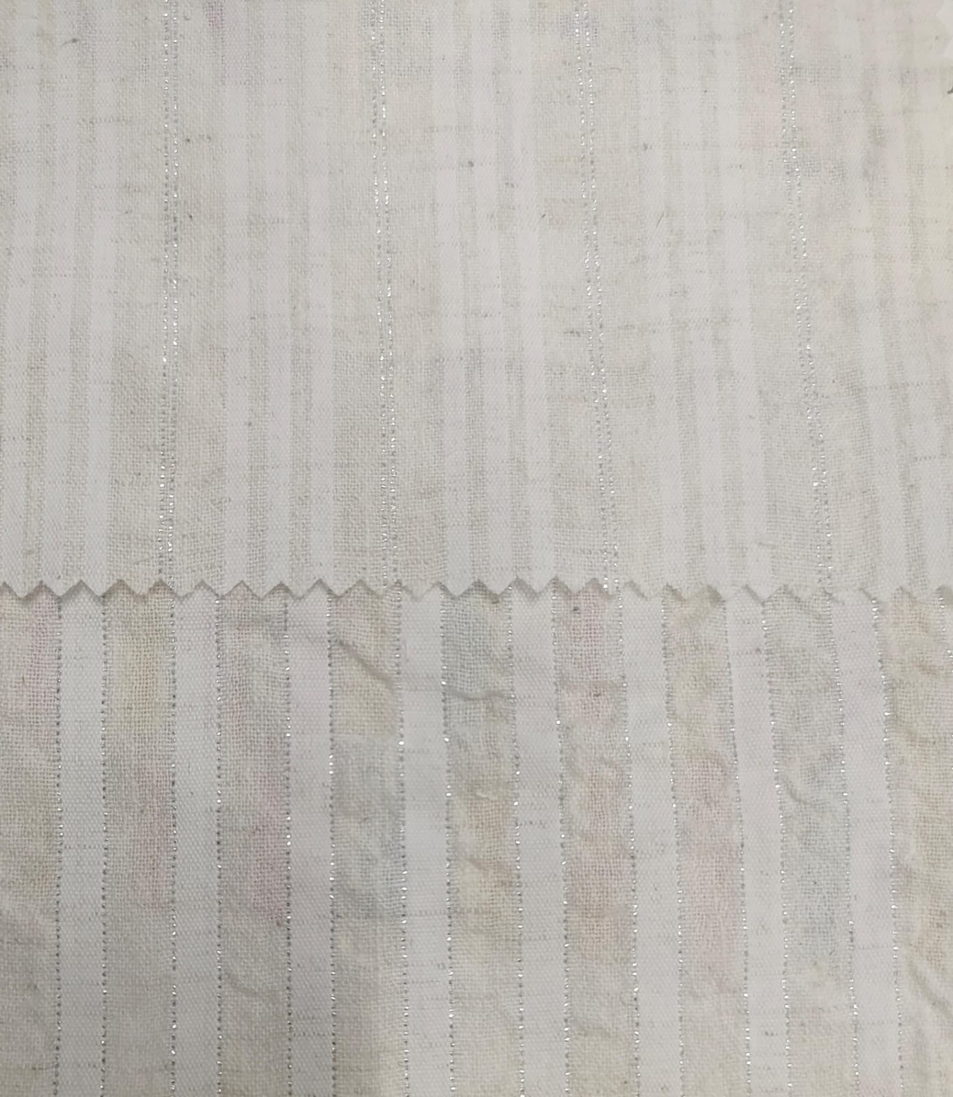 Close-up of soft, wrinkled pink cotton fabric displaying fine weave texture.
