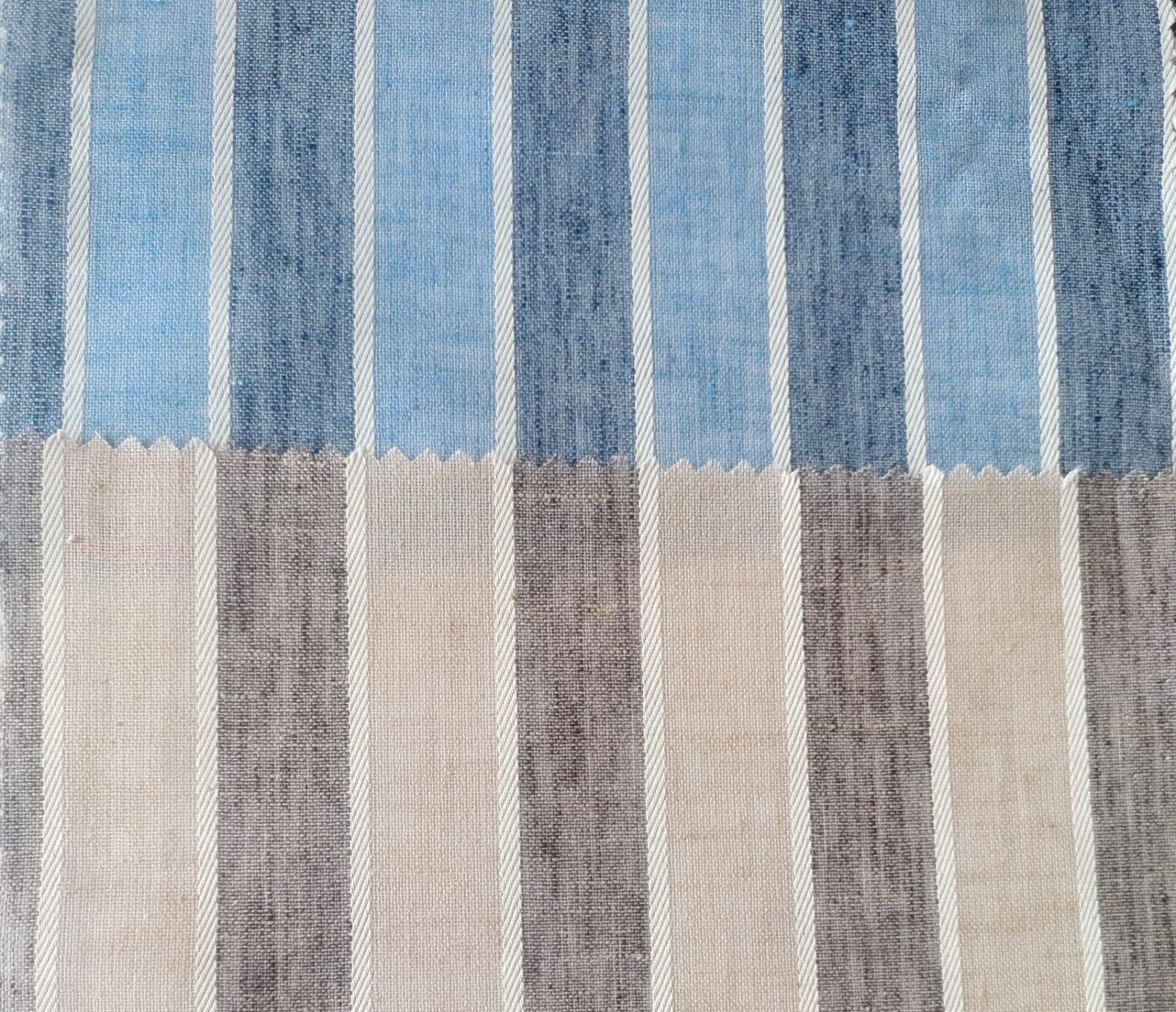Close-up of soft, wrinkled pink cotton fabric displaying fine weave texture.