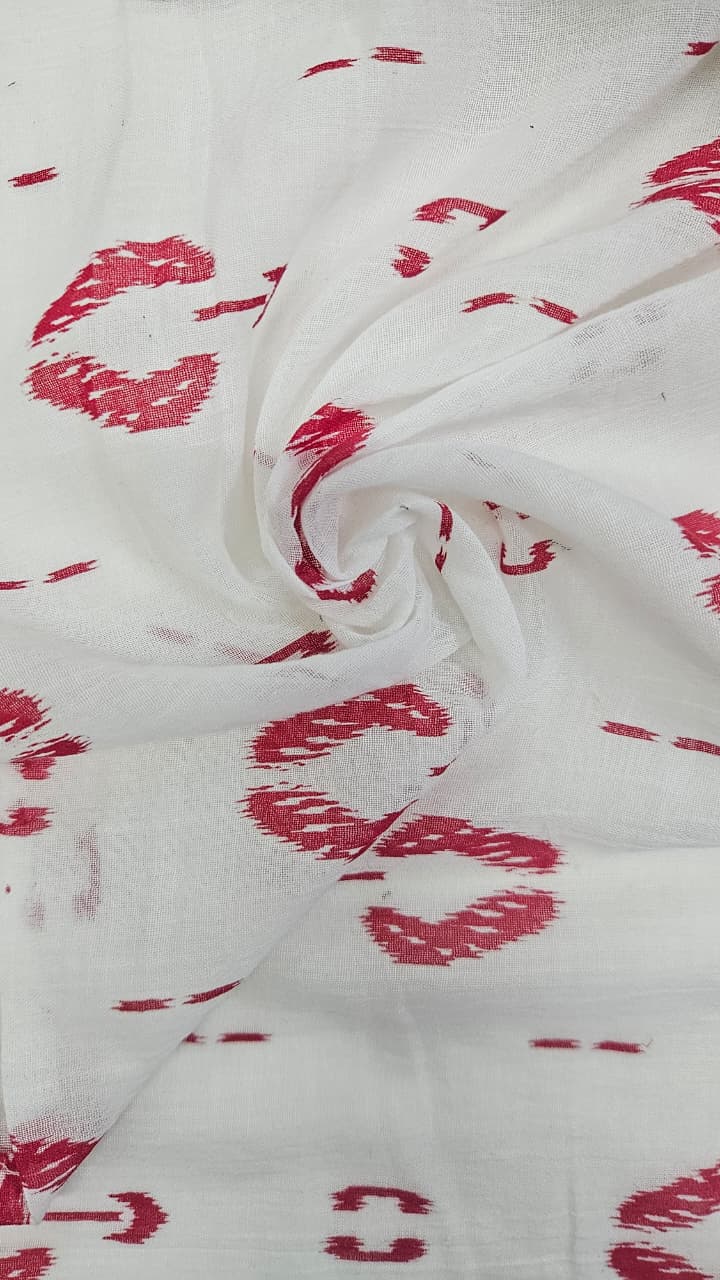 Close-up of soft, wrinkled pink cotton fabric displaying fine weave texture.