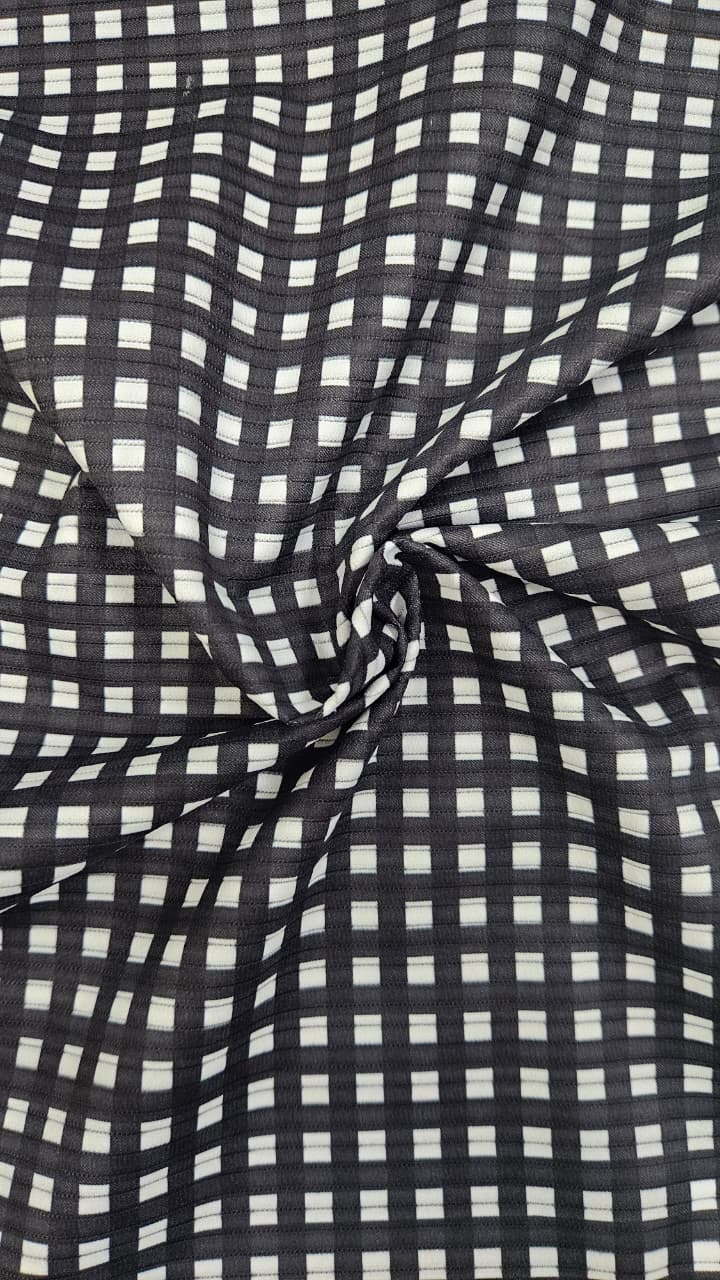 Close-up of soft, wrinkled pink cotton fabric displaying fine weave texture.