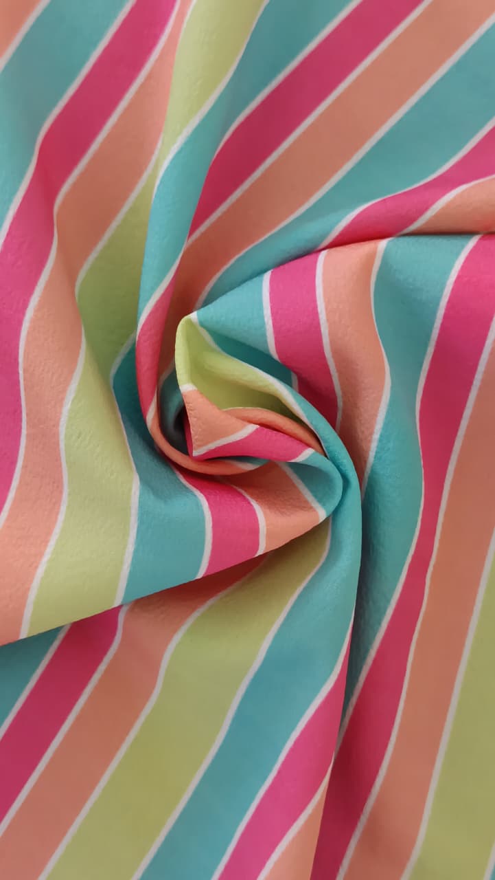 Close-up of soft, wrinkled pink cotton fabric displaying fine weave texture.