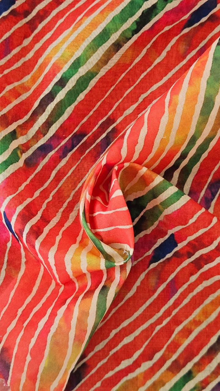 Close-up of soft, wrinkled pink cotton fabric displaying fine weave texture.