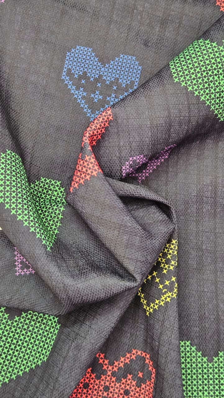 Close-up of soft, wrinkled pink cotton fabric displaying fine weave texture.