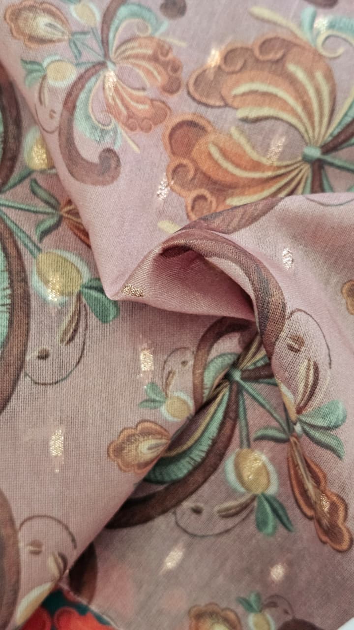 Close-up of soft, wrinkled pink cotton fabric displaying fine weave texture.