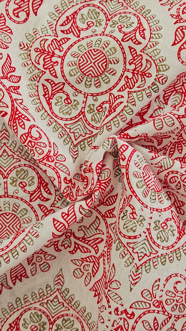 Close-up of soft, wrinkled pink cotton fabric displaying fine weave texture.