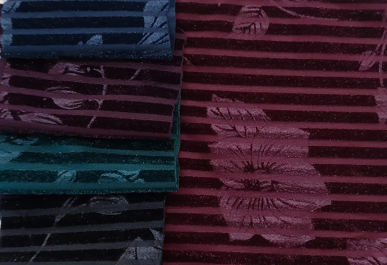 Close-up of soft, wrinkled pink cotton fabric displaying fine weave texture.