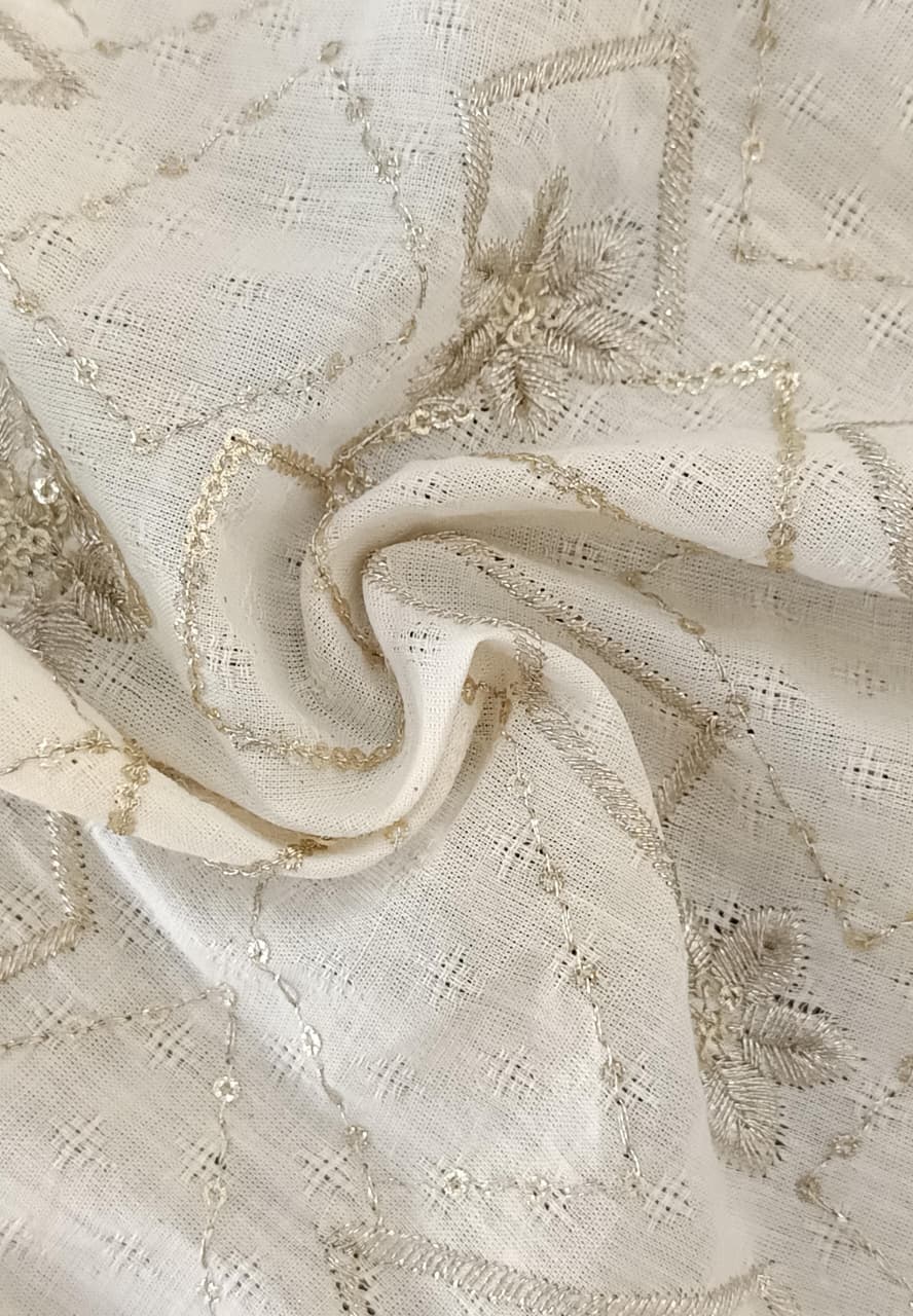 Close-up of soft, wrinkled pink cotton fabric displaying fine weave texture.