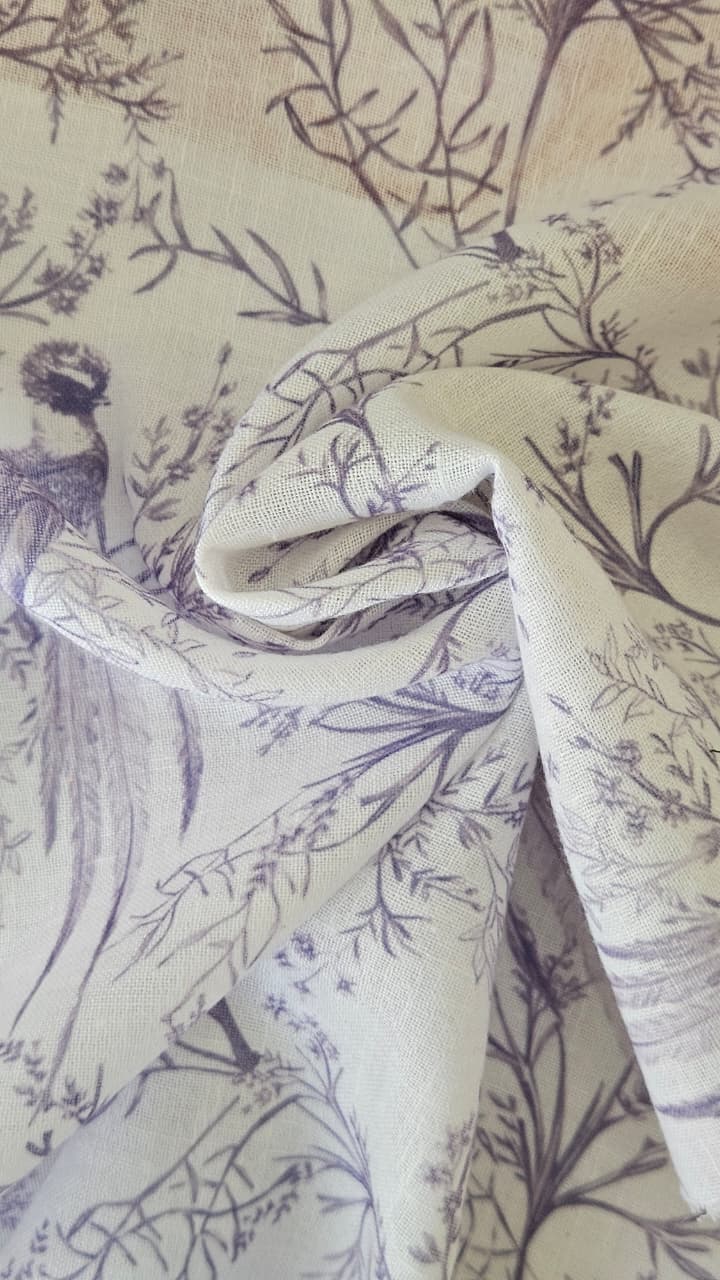 Close-up of soft, wrinkled pink cotton fabric displaying fine weave texture.