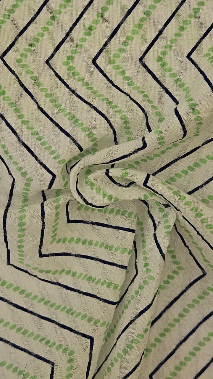 Close-up of soft, wrinkled pink cotton fabric displaying fine weave texture.