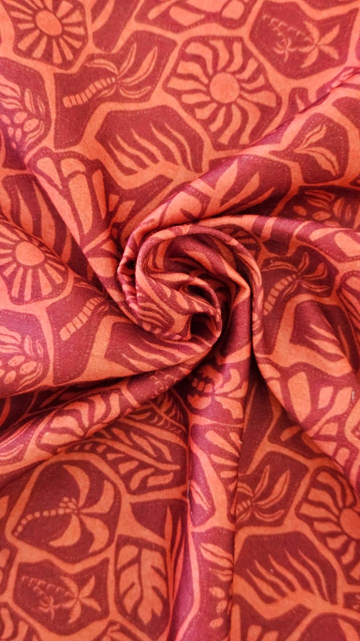 Close-up of soft, wrinkled pink cotton fabric displaying fine weave texture.