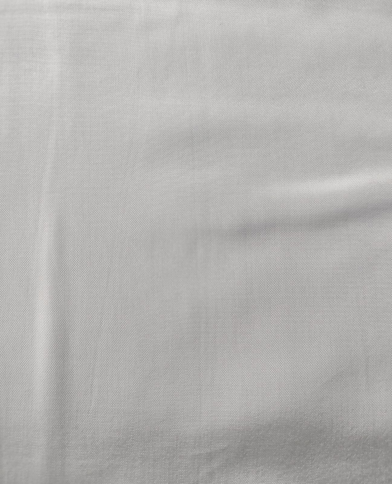 Close-up of soft, wrinkled pink cotton fabric displaying fine weave texture.