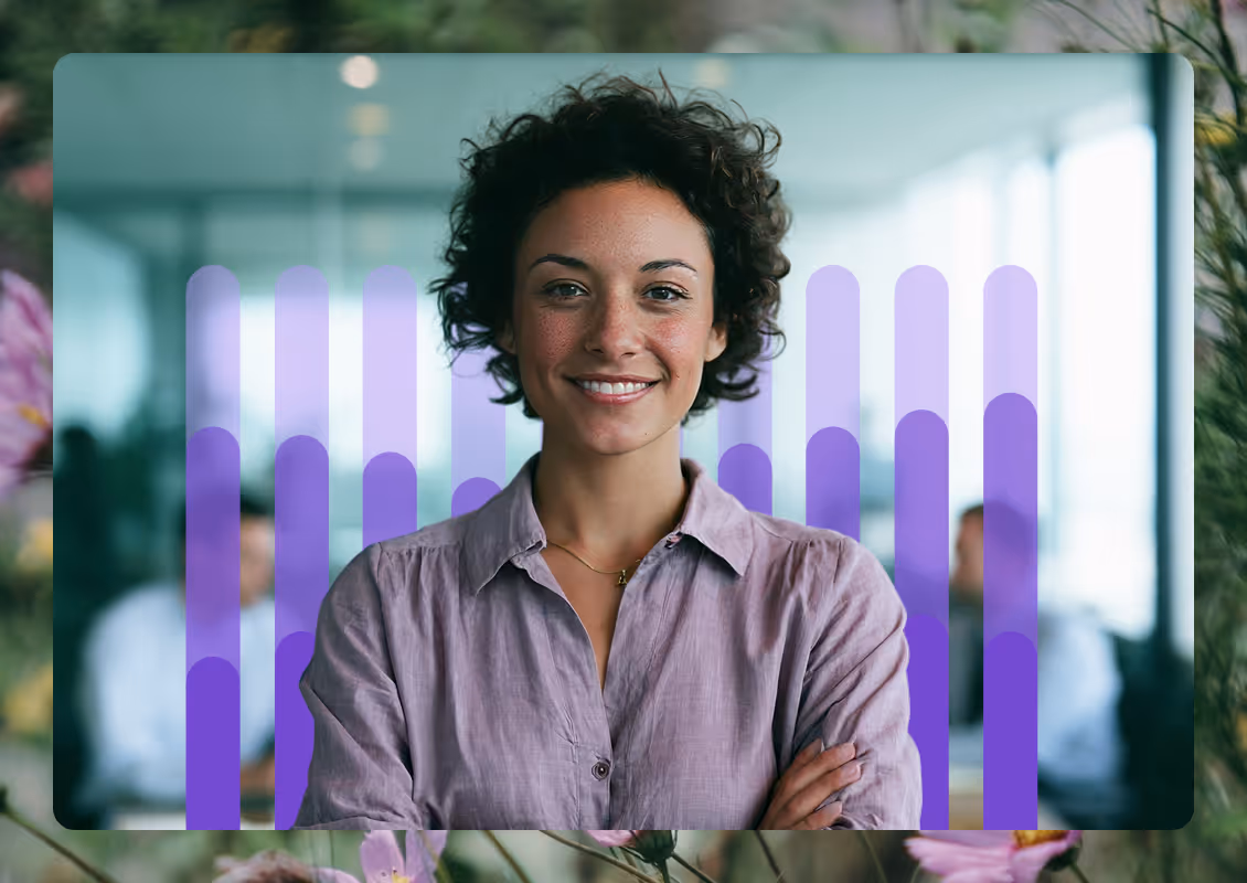 Smiling woman with curly hair in office, purple shirt, with translucent purple data graphs overlayed.