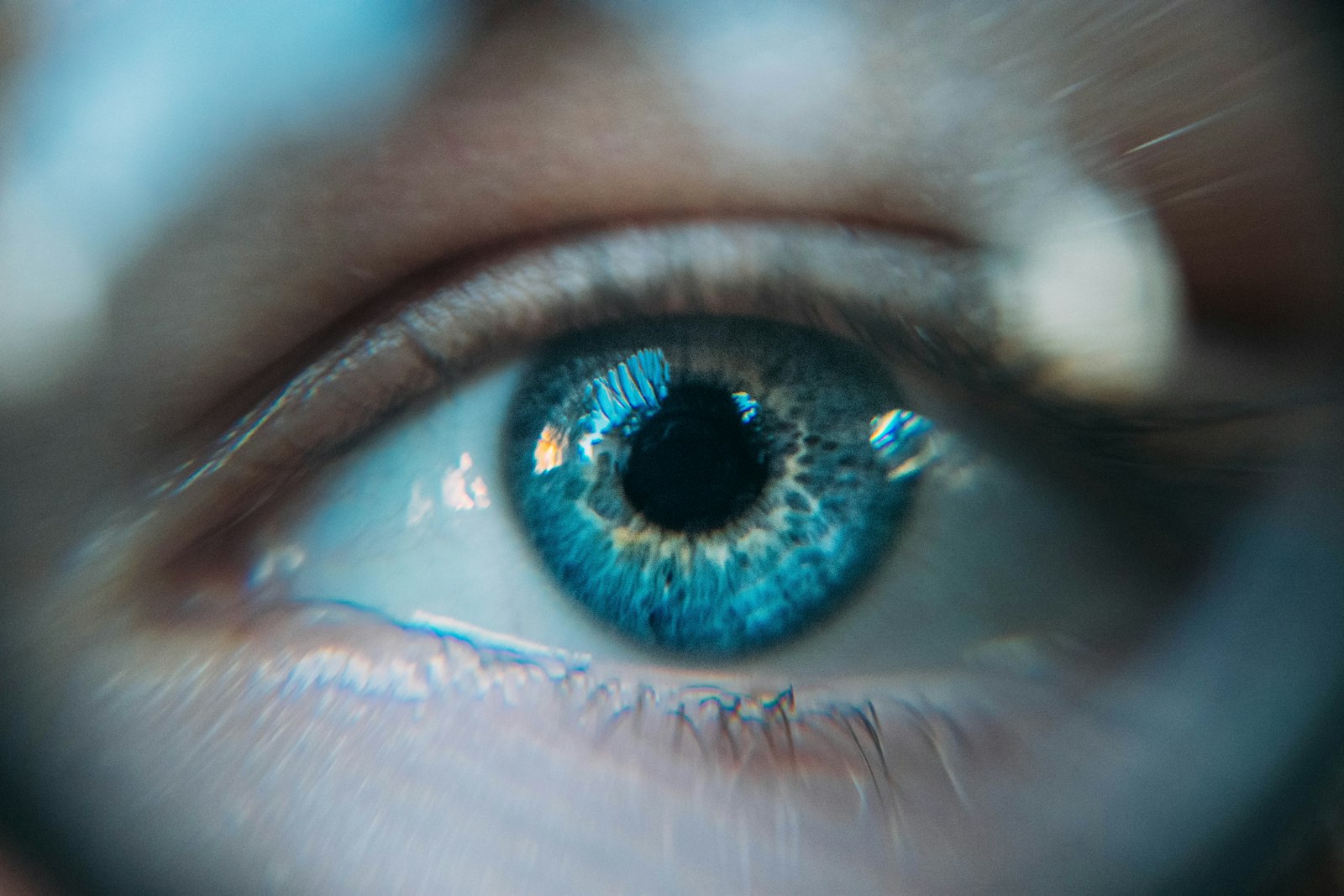 Close-up of a blue human eye relevant to implantable contact lens procedures