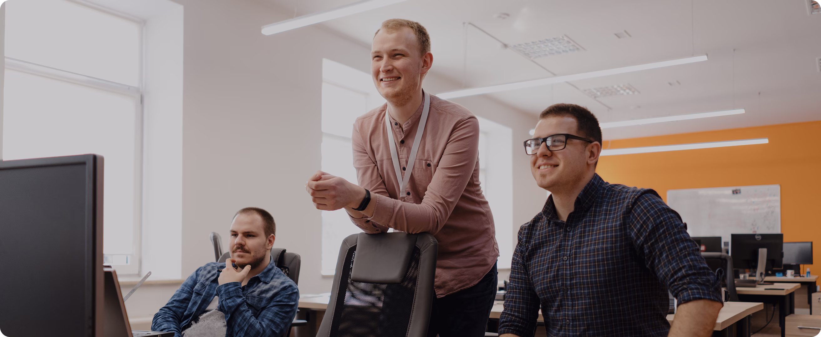men watching a presentation Image