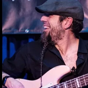 Damian Erskine playing bass