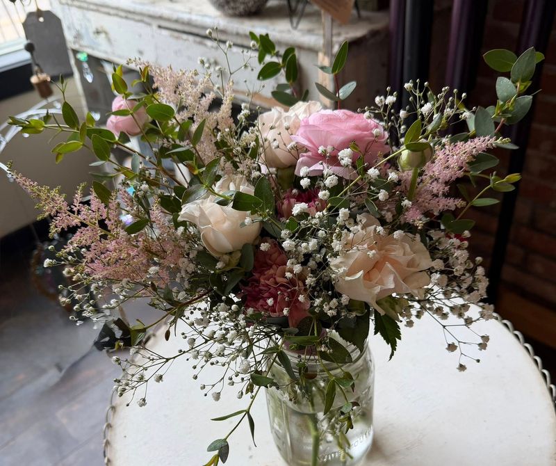 Soft blush rose arrangement with baby's breath