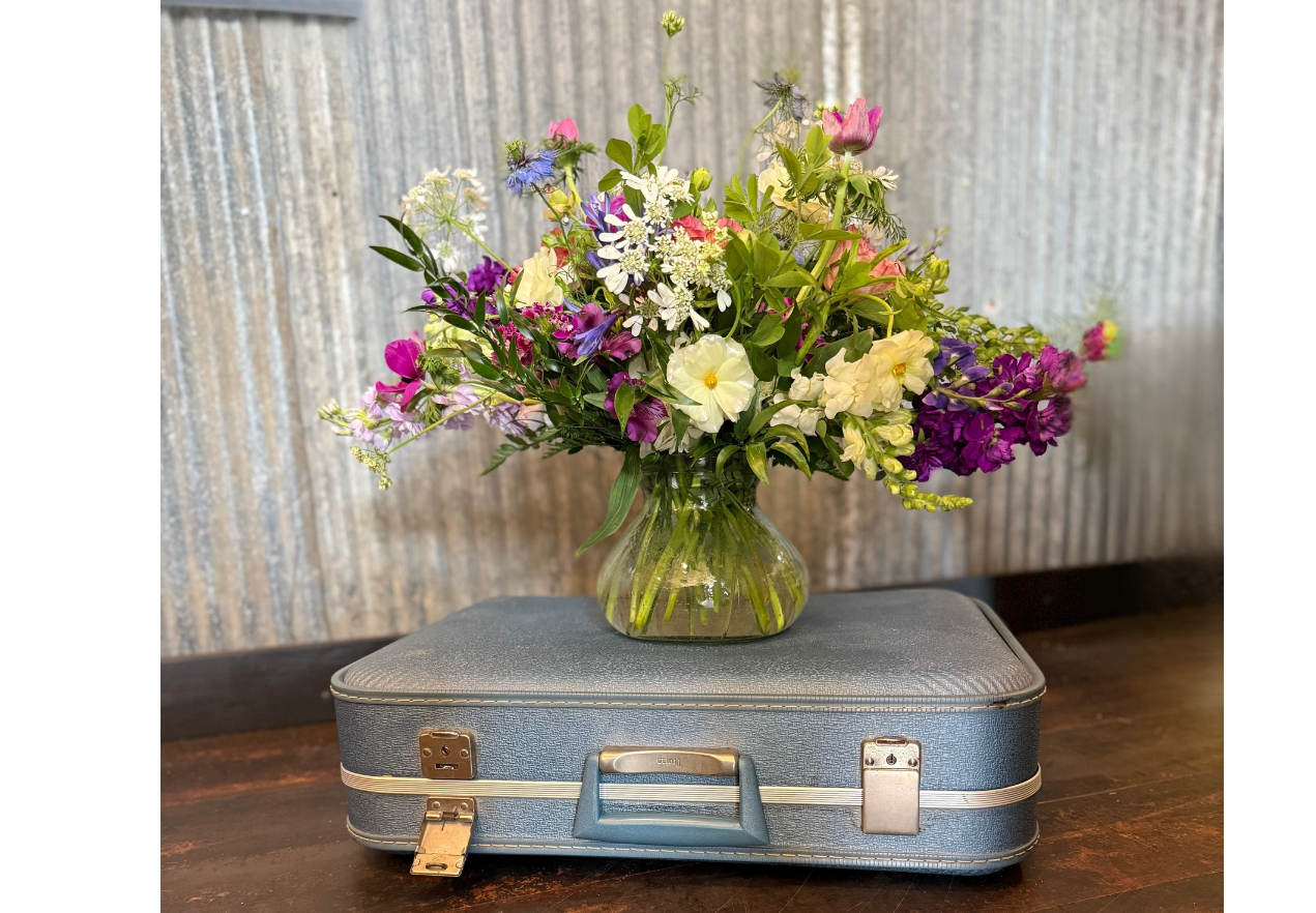 Vintage suitcase floral arrangement