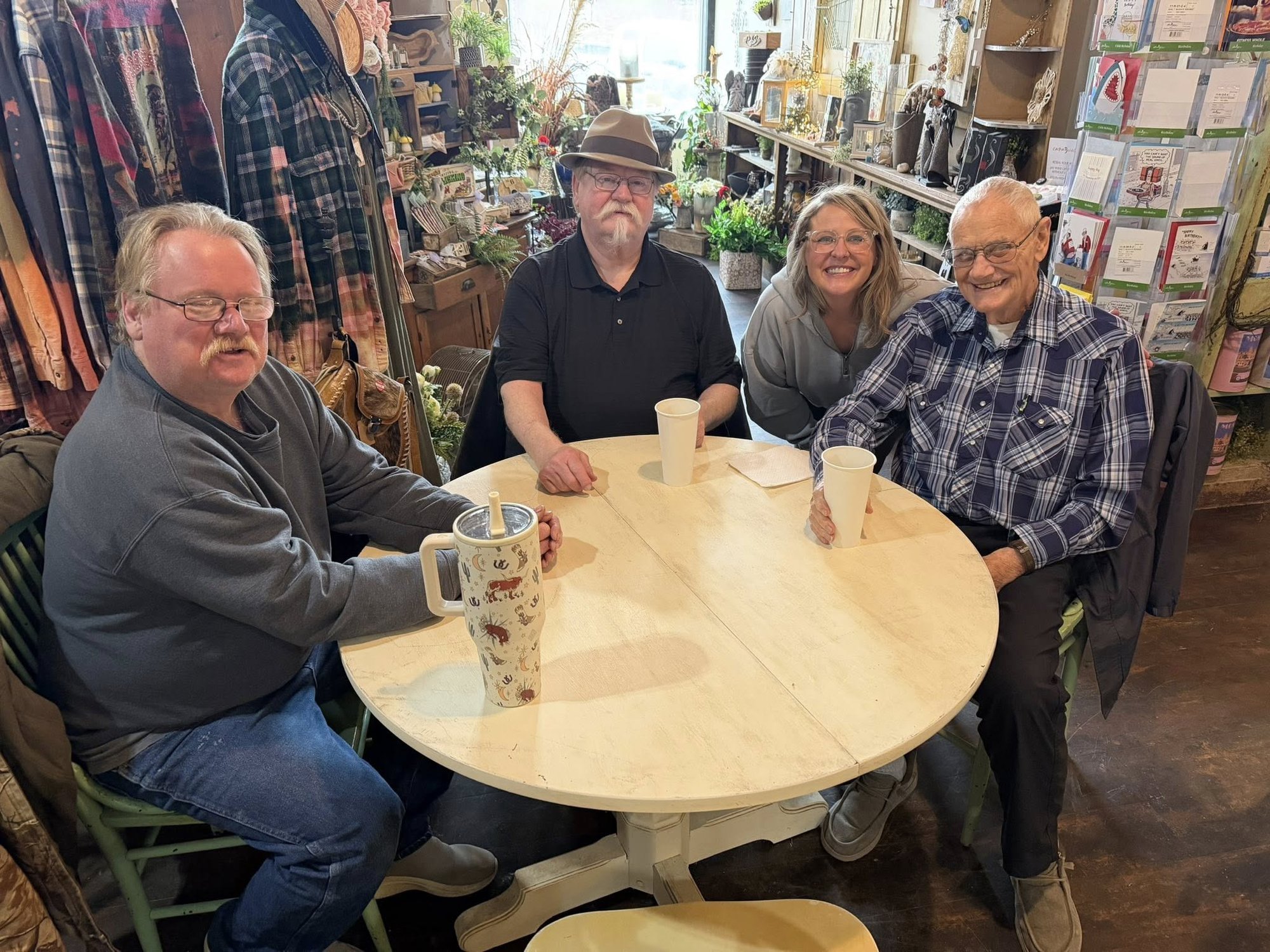Customers at The Hidden Kitchen counter inside the Simply Blooming building