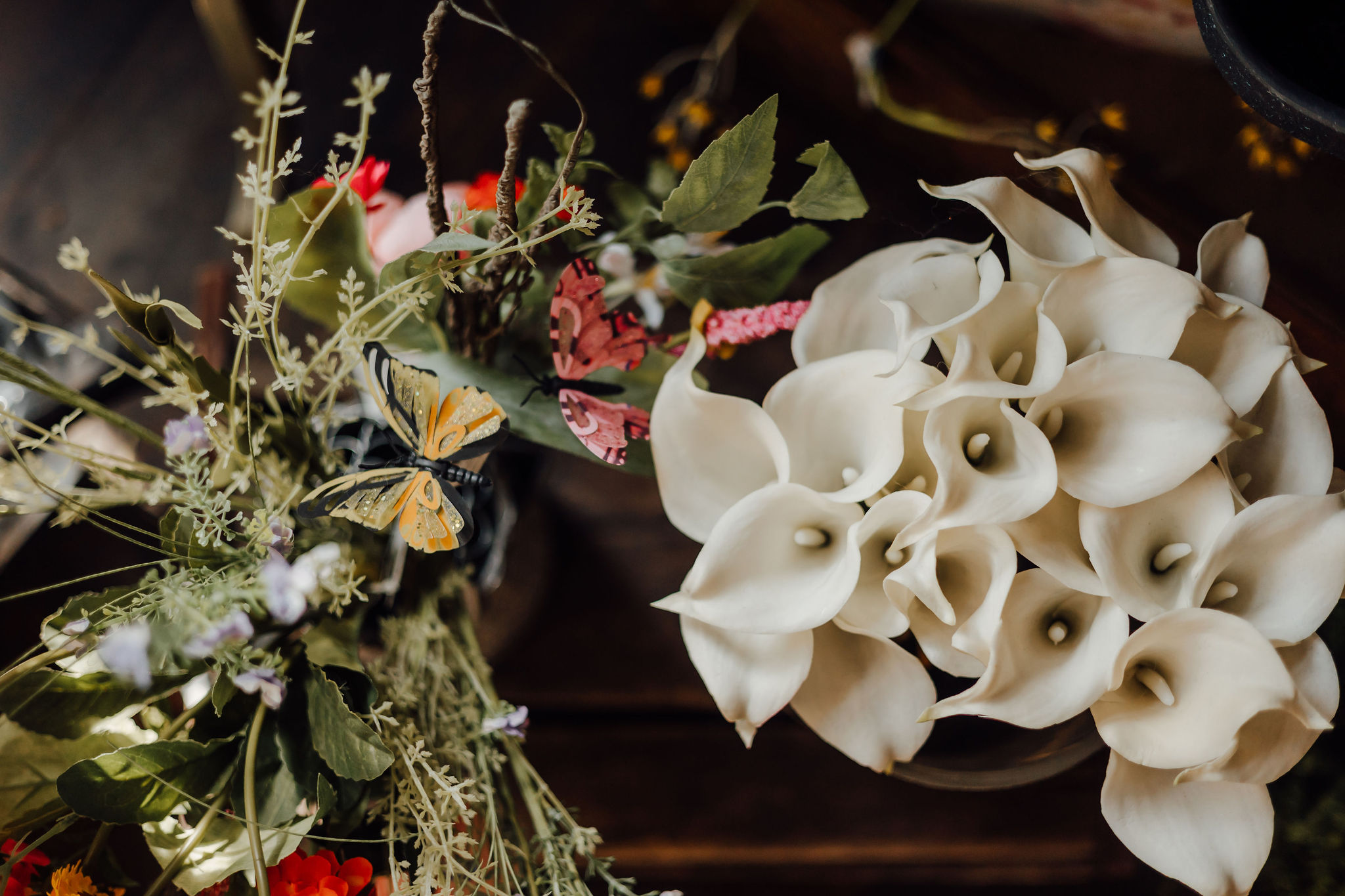 Calla lilies and wildflowers with butterflies inside Simply Blooming