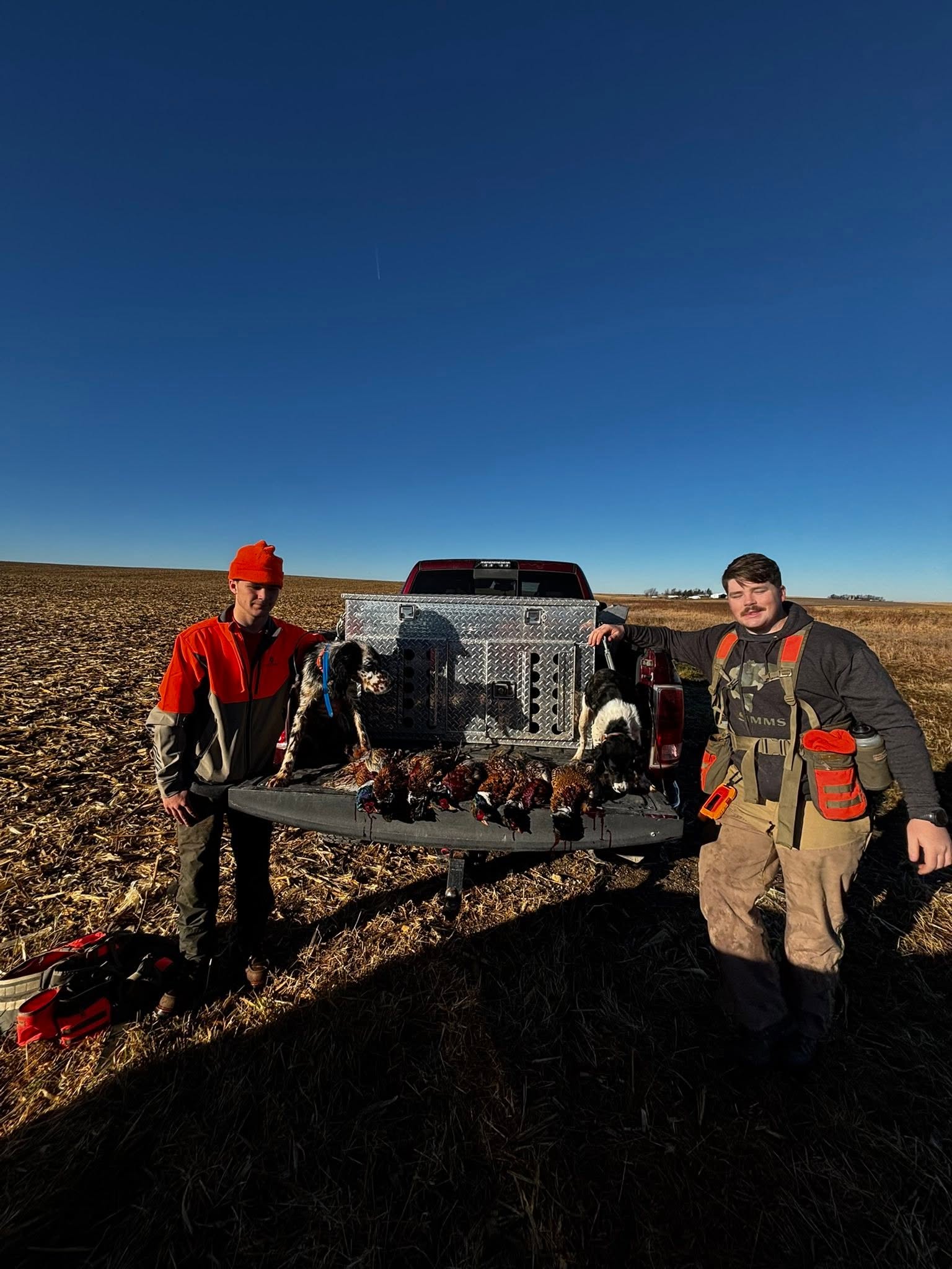 The boys with a tailgate full of birds