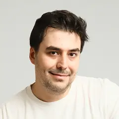 A portrait of Alex Galizdra, the founder and CEO of Sparqs Agency