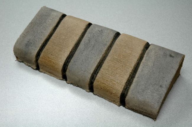 Shaded Single Brick slant concrete curbing texture