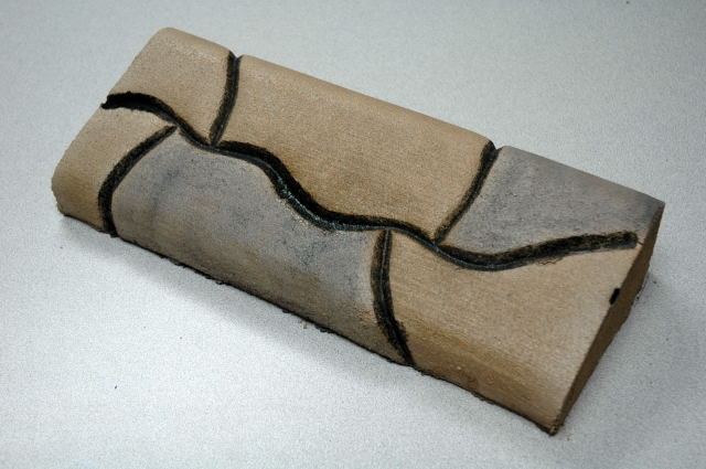 Shaded Random Rock slant concrete curbing texture